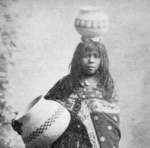INDIAN WOMAN WITH BASKETS.