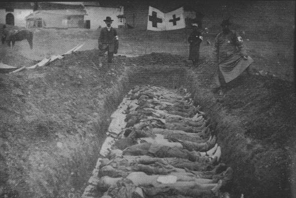 RED CROSS WORK IN CHINESE REVOLUTION

Red Cross workers at mass graves of men killed during the the Chinese
Revolution.