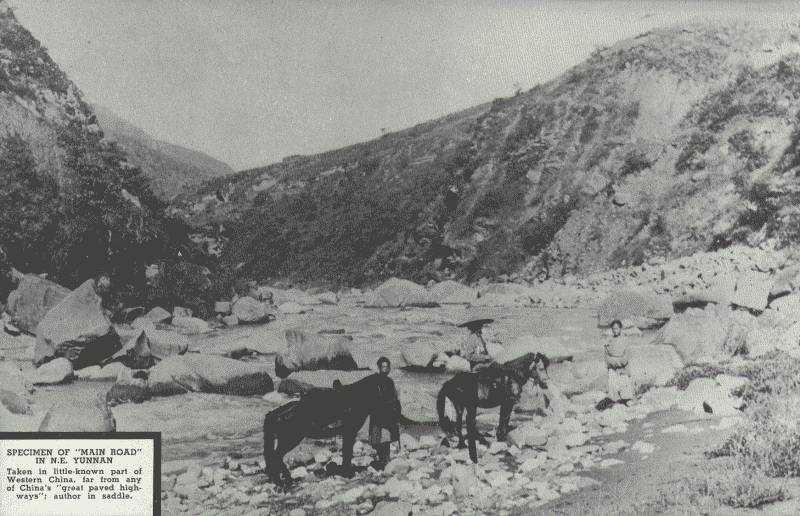 SPECIMEN OF "MAIN ROAD" IN N.E. YÜN-NAN

Taken in the little-known part of Western China, far from any of China's
"great paved highways"; author is in saddle.