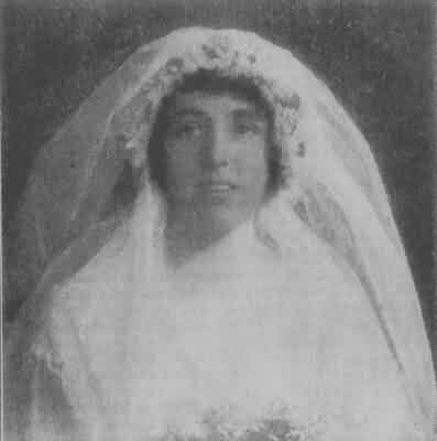 Woman in Bridal Veil and Gown