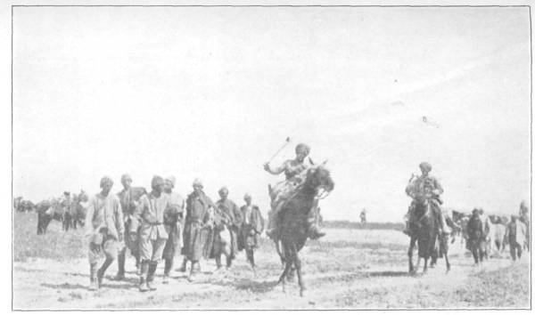 Indian cavalry bringing in prisoners after the charge