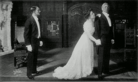 [Photo, from the play,
of Jefferson and Shirley appealing to Mr. Ryder]
