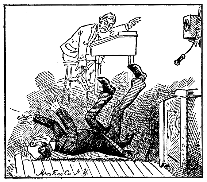 A man falls backward away from a wall-mounted telephone