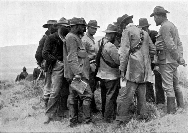 BOER COMMANDANTS READING MESSAGE FROM BRITISH OFFICERS AFTER THE BATTLE OF DUNDEE