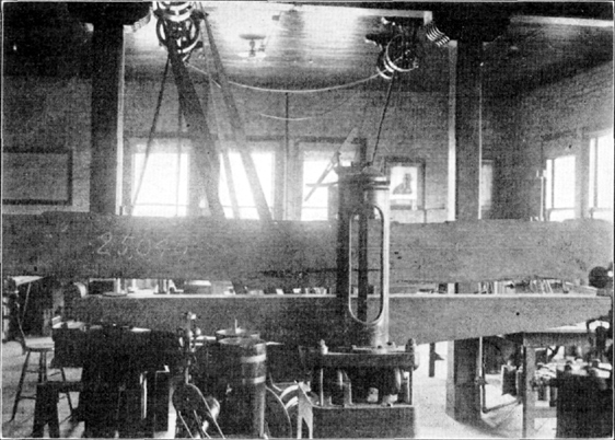 Plate I, Fig. 1.&mdash;Specimen in Testing Machine, Showing Method of Support.