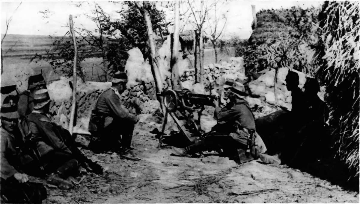 SOME OF THE 2500 GERMANS CAPTURED AT TSING-TAU: MEN OF THE THIRD SEA BATTALION WITH A MACHINE-GUN DURING THE SIEGE.