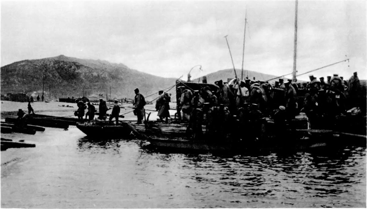 MEN OF "THE GALLANT ARMY AND NAVY OF JAPAN" WHO CAPTURED TSING-TAU: JAPANESE TROOPS LANDING IN LAO-SHAN BAY.