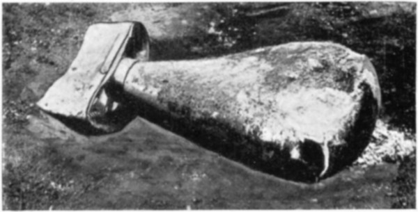 TYPICAL OF THOSE USED BY GERMAN AIR-CRAFT DURING THE WAR: A BOMB RECENTLY DROPPED FROM AN AEROPLANE INTO WARSAW.