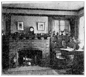 A photograph of a living room with fireplace.