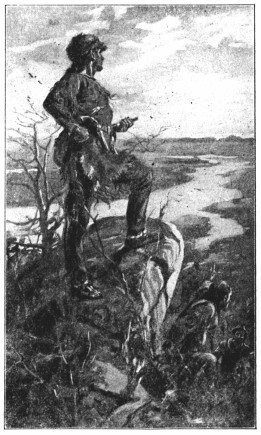 A copy of a painting showing a man standing atop a rock, looking over a river.