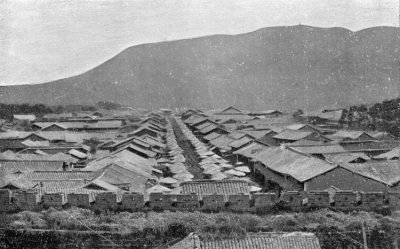 THE SUBURB BEYOND THE SOUTH GATE OF TENGYUEH. (Stalls
under the Umbrellas.)