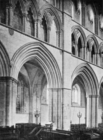 SOUTH NAVE ARCADE, SHOWING THE JUNCTION OF THIRTEENTH AND
FOURTEENTH-CENTURY WORK.