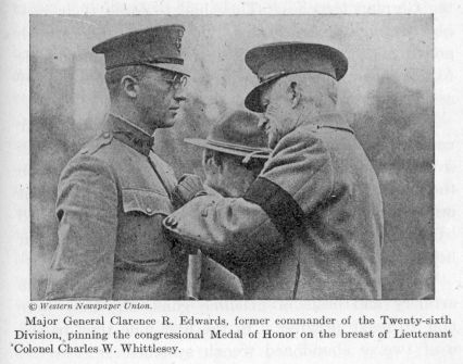 Major General Clarence R. Edwards, former commander of the Twenty-sixth Division, pinning the congressional Medal of Honor on the breast of Lieutenant Colonel Charles W. Whittlesey.