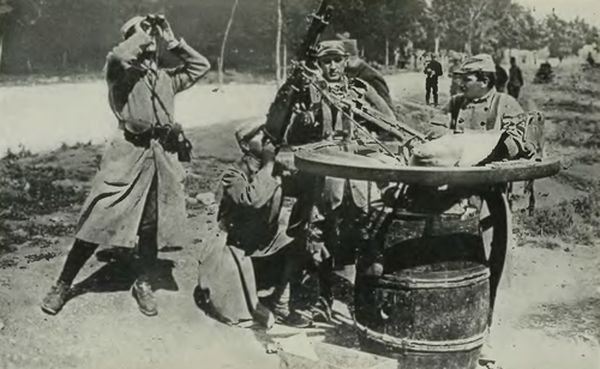 French Using an Ordinary Wine Barrel on which a Wagon
Wheel Is Mounted to Facilitate the Revolving Movement to Any Desired
Direction