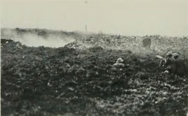 A Shell Exploding in Front of a Dug-in Machine Gun