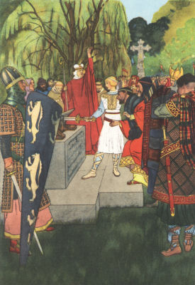 Arthur pulls the sword Excalibur from the stone as a group of knights
look on.