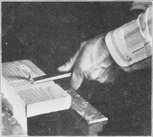 Fig. 70. Chiseling Out a Dado. (First Step).