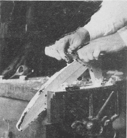 Fig. 120. Using a Spokeshave.