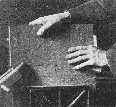 Fig. 261. Rubbing a Glued Joint.
