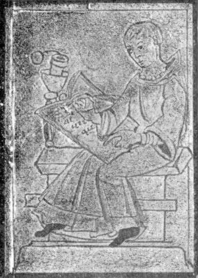 monk sitting on a bench reading a manuscript
