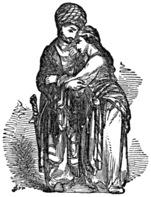 A man and woman hold one another