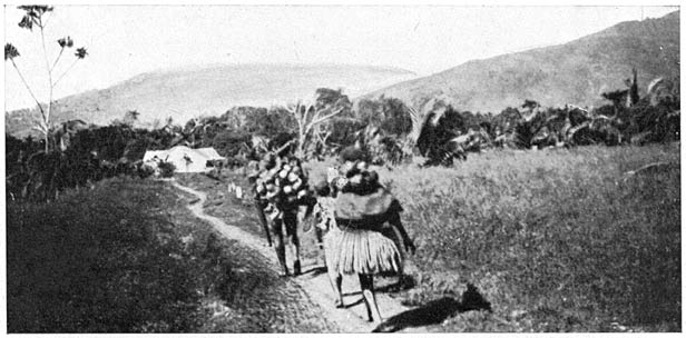 Inboorlingen op weg naar den koopman.