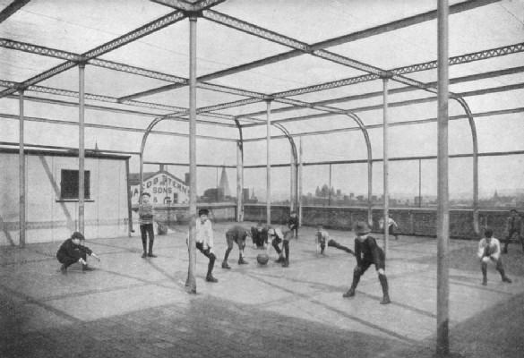plate: BALL GAME ON THE ROOF PLAYGROUND OF A PUBLIC SCHOOL
