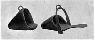 Stirrup iron with closed cover to front. Stirrup iron with closed toe area and a tongue to support the heel.