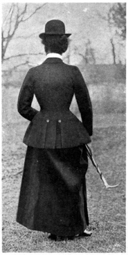 Rear view of standing woman.