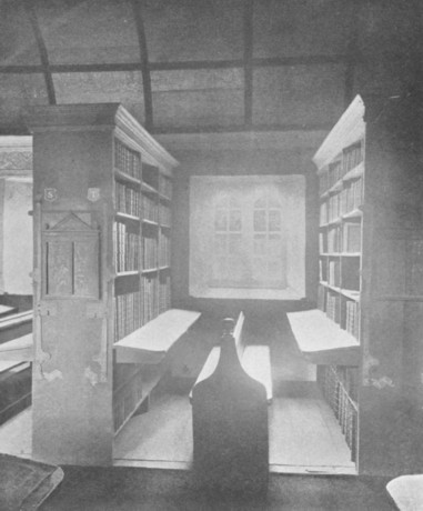 Fig. 70. Bookcases and seat in the Library at Corpus Christi College, Oxford. From a photograph taken in 1894.