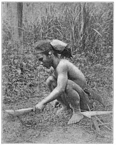 An Ilongot Man at Work in Clearing.