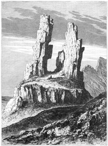 A large rock outcrop on a hilltop