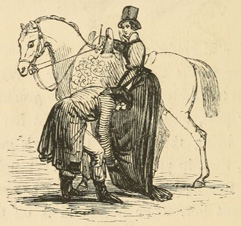 Man preparing to give the woman a leg up to mount