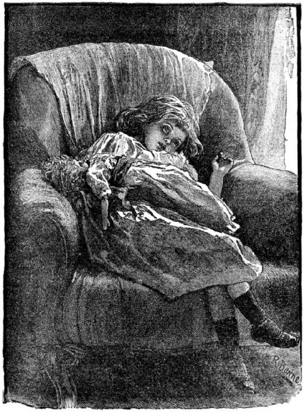 Sirena slouched in an armchair with her doll