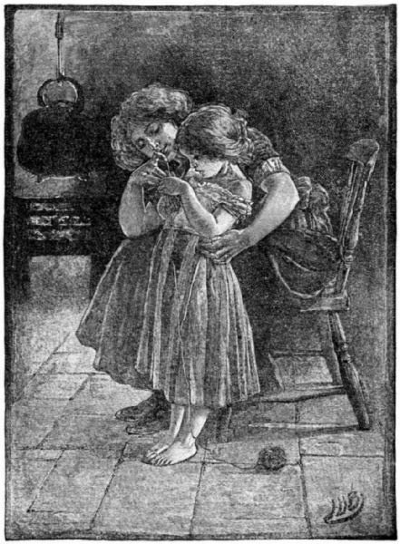 A woman teaches a little girl
