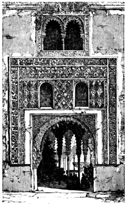 Showing arched entrance surrounded with extensive decoration