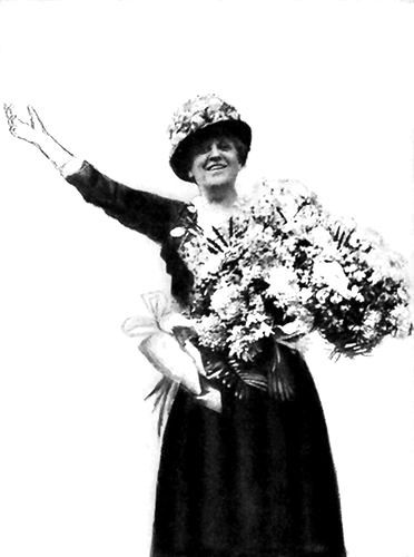 MRS. CARRIE CHAPMAN CATT. President of the
International Woman Suffrage Alliance from its founding in 1904 and of
the National American Woman Suffrage Association 1900-1904 and from
1915.

Standing in an automobile on the way from the railroad station in New
York after the campaign for ratification of the Federal Suffrage
Amendment was completed by Tennessee. (See page 652.)