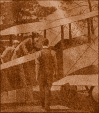 Photograph of Miss Cole entering Biplane.