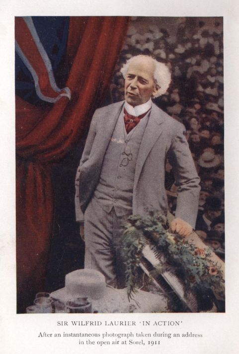 SIR WILFRID LAURIER 'IN ACTION' After an instantaneous photograph taken during an address in the open air at Sorel, 1911