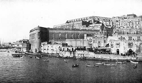 THE HARBOR IS SURROUNDED BY OLD GRAY FORTRESSES.