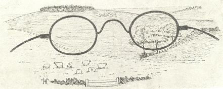 Sketch of pair of glasses on sketch of landscape