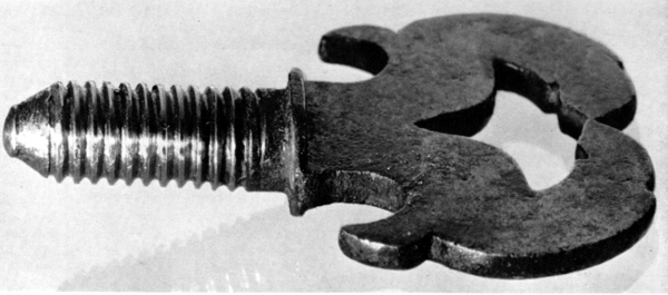 Figure 8.—Binding screw seen at A in figure 3, showing
the long smooth fadeout of the thread below the shoulder. (Smithsonian
photo 49276.)