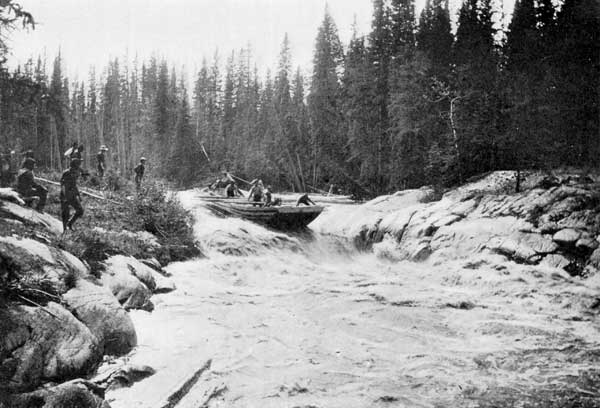 Traders running a mackinaw or keel-boat down the rapids
of Slave River without unloading.