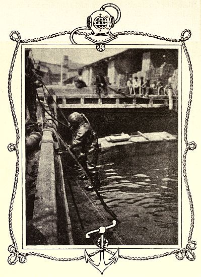 THE AUTHOR GOING DOWN IN A DIVER'S SUIT.