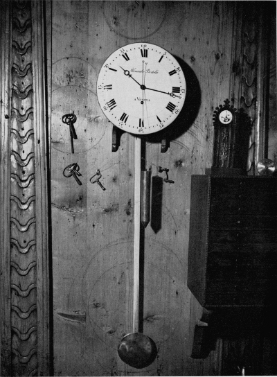 Figure 28.—Detail of wall of Bertolla's workshop, with
regulatory clock made by his nephew, Alessandro Bertolla of Venice. Note
wheel layouts, etc., scribed in the paneling. (Courtesy of Museo
Nazionale della Scienza e della Tecnica, Milan.)