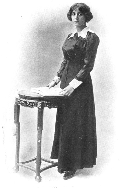 "Oh, that's Miss Farnum. She's Old Mrs. Kilpatrick's
companion."