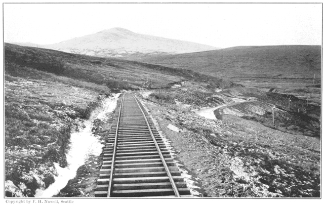 Copyright by F. H. Nowell, Seattle

Council City and Solomon River Railroad—A Characteristic Landscape of
Seward Peninsula