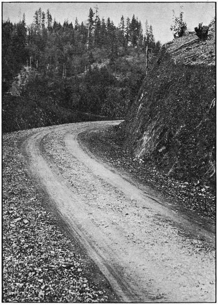 ON THE WOLF CREEK-GRAVE
CREEK SECTION OF THE PACIFIC HIGHWAY IN JOSEPHINE COUNTY. GRADED IN 1918