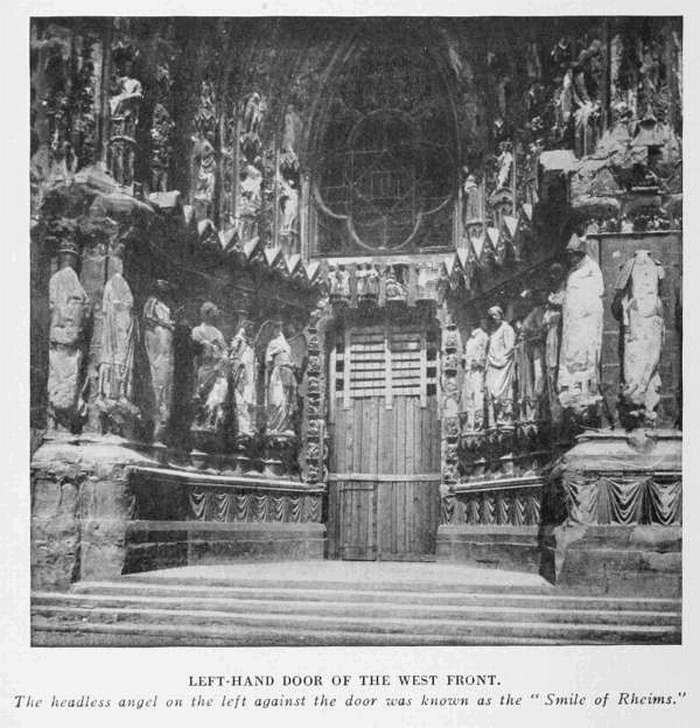 LEFT-HAND DOOR OF THE WEST FRONT
The headless angel on the left against the door was known as the "Smile of Rheims."