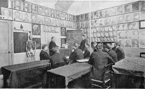 DETECTIVES RECEIVING A LECTURE ON THE METHOD OF
IDENTIFICATION BY NOSES.

From a Photo.
